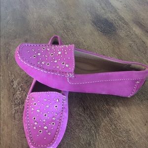 Clark’s hot pink loafers.